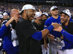 Edwin Encarnacion of the Toronto Blue Jays celebrates after the Toronto Blue Jays defeated the Texas Rangers 7-6 for game three of the American League Division Series at Rogers Centre on October 9, 2016 in Toronto, Canada. (Vaughn Ridley/Getty Images)