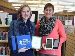 Jessica Horne, Assistant to the CEO and Christina Blazecka, Chief Executive Officer of the library display their newest award along with some of the implements that they used to receive the honour. The collaboration with CDSSAB provided training to the residents of the new Senior Complex.