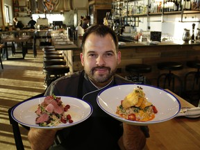 Chef Paul with plates of food. Larry Wong/postmedia