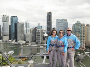 The adventurous MacNaull family, Grace, left, Kerry and Steve pose for a photo atop Story Bridge in Brisbane, Australia. PHOTO COURTESY GABY SHERIDAN