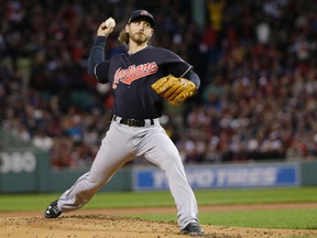 Indians starting pitcher Josh Tomlin delivers against the Red Sox during Game 3 of the AL Division Series in Boston on Monday, Oct. 10, 2016. (AP Photo/Elise Amendola)