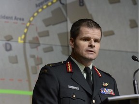 Brig.-Gen. Mike Rouleau addresses a news conference in Ottawa, Tuesday, May 12, 2015. Investigations into the friendly-fire incident that killed a Canadian soldier in Iraq have concluded that the death of Sgt. Andrew Doiron was "a tragic case of mistaken identity." THE CANADIAN PRESS/Adrian Wyld