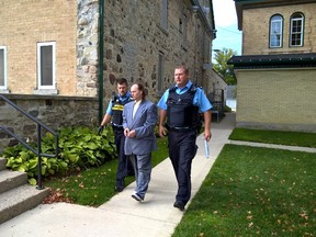 Anthony Edward Ringel, 47, is led away to jail after pleading guilty Tuesday, Oct. 11 in Walkerton to second degree murder in the death of Christine Harron more than 23 years ago. (Scott Dunn/The Sun Times)