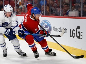 Toronto Maple Leafs Auston Matthews, left, ties up Montreal Canadiens defenseman Shea Weber during preseason NHL action at the Bell centre in Montreal on Thursday October 6, 2016. (Allen McInnis / MONTREAL GAZETTE)