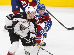 Edmonton's Trey Fix-Wolansky pursues Vancouver's Tyler Benson during the Edmonton Oil Kings' loss to the Vancouver Giants at Rogers Place on Monday. (Codie McLachlan)