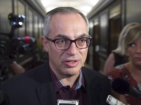 Tony Clement arrives at the national Conservative summer caucus retreat in Halifax on Tuesday, Sept. 13, 2016. Former Ontario and federal cabinet minister Tony Clement has dropped out of the federal Conservative leadership race. THE CANADIAN PRESS/Andrew Vaughan