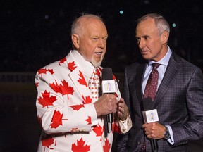 Don Cherry and Ron MacLean talk during the World Cup of Hockey in Toronto on Sept. 29, 2016. (Craig Robertson/Toronto Sun/Postmedia Network)