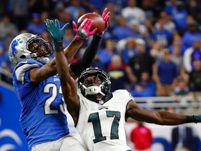 Lions cornerback Darius Slay intercepts a pass intended for Eagles wide receiver Nelson Agholor during the second half NFL action in Detroit on Oct. 9, 2016. (Paul Sancya/AP Photo)