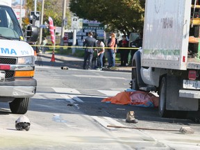 Toronto Police at the scene after a construction worker was hit and killed at the corner of Eglinton and Midland on Wednesday, October 12, 2016. (Veronica Henri/Toronto Sun)