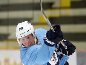 Jets forward Patrik Laine fires a shot on net during practice in Winnipeg on Sept. 26, 2016. (Brian Donogh/Postmedia Network)