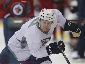Winnipeg Jets left winger Kyle Connor works out during practice on Wednesday. (Brian Donogh/Winnipeg Sun)