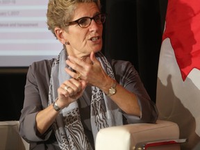 Ontario Premier Kathleen Wynne takes part in a fire side chat at the Greater Kingston Chamber of Commerce luncheon in Kingston, Ont. on Wednesday, Oct. 12, 2016. Elliot Ferguson/The Whig-standard/Postmedia Network