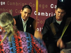 Wabnode Drummers perform the honouring song prior to a funding announcement at Cambrian College on Wednesday. Ben Leeson/The Sudbury Star/Postmedia Network