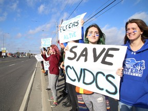 Gino Donato/Sudbury Star
Students at Chelmsford Valley District Composite School line Highway 144 during  a student walkout in Sudbury on Wednesday. The school is under review by the Rainbow District School Board for possible closure.
