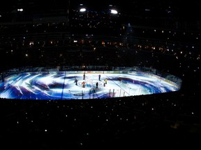 Native drummers and a rink-wide light show kicked off the opening ceremonies of Wednesday's home opener between the Oilers and Flames at Rogers Place. (David Bloom)