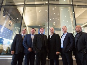 Edmonton Oilers alumni, from left, Glenn Anderson, Jari Kurri, Wayne Gretzky, Mark Messier, Paul Coffey and Grant Fuhr attend the unveiling of the Wayne Gretzky statue and Hall of Fame room at Rogers Place on Wednesday. (The Canadian Press)