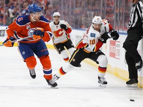 Adam Larsson chases Flames Kris Versteeg during Wednesday's game at Rogers Place. (Ian Kucerak)