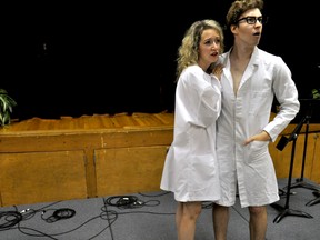 Mara Fraccaro as Janet (left) and Patrick Avery-Kenny as Brad rehearse a scene from The Rocky Horror Show in London Ont. September 29, 2016. CHRIS MONTANINI\LONDONER\POSTMEDIA NETWORK
