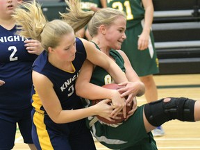 CHRIS ABBOTT/TILLSONBURG NEWS
Gemini's Denika Waite (right) wins a loose ball Tuesday. CASS senior girls defeated Glendale 31-7.