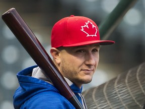Toronto Blue Jays shortstop Troy Tulowitzki watches during batting practice in preparation of game one of the American League Championship Series in Cleveland on Thursday, October 13, 2016. (THE CANADIAN PRESS/Nathan Denette)