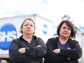 Nicole Mallette, vice president of CUPE Local 2841, and Gisele Dawson, president of the local, stand outside Sudbury Hospital Services. About 40 jobs will be lost at the company early next year because Health Sciences North has switched suppliers for its laundry. (Gino Donato/Sudbury Star)