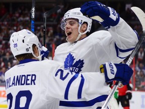 Toronto Maple Leafs center Auston Matthews celebrates a first period goal with teammate William Nylander during NHL hockey action in Ottawa on Wednesday, Oct. 12, 2016. (THE CANADIAN PRESS/Sean Kilpatrick)