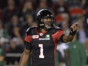 Ottawa Redblacks quarterback Henry Burris makes a call during second half CFL action against the Saskatchewan Roughriders on Friday, Oct. 7, 2016 in Ottawa. (THE CANADIAN PRESS/Justin Tang)