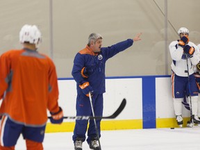 Todd McLellan shouts instructions during practice Thursday at the community rink at Rogers Place. (Ian Kucerak)