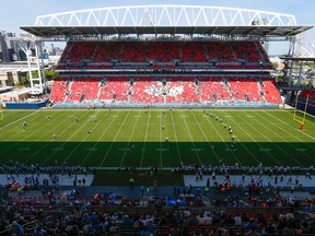 The Toronto Argonauts and Hamilton Tiger Cats prepare to start a CFL preseason game at BMO Field in Toronto on June 11, 2016. (JACK BOLAND/Toronto Sun files)