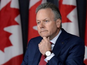 Justin Tang/The Canadian Press
Governor of the Bank of Canada Stephen Poloz speaks to reporters after making an interest rate announcement and releasing the Monetary Policy Report on July 13. The perplexingly persistent sluggishness of exports has slowed Canada’s adjustment to low oil prices, the country's central banker said Saturday.The problem continues to confound, Poloz said.