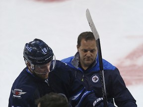 Winnipeg Jets centre Bryan Little heads to the dressing room after being injured against the Carolina Hurricanes on Thursday night. (Kevin King/Winnipeg Sun)