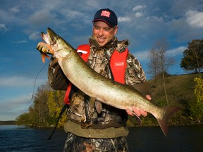 Gord Ellis catches a mid-sized musky early on.