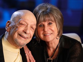 In this Sept. 22, 2016 photo, songwriter Fred Foster poses with Barbara “Bobbie" Eden, right, at the Country Music Hall of Fame and Museum in Nashville, Tenn. Eden's last name was McKee when she worked as a secretary in the same office building with Foster when he and Kris Kristofferson wrote “Me and Bobby McGee.” Her name was the inspiration for the song. (AP Photo/Mark Humphrey)