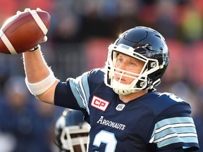 Toronto Argonauts' Drew Willy fakes a pass against the Calgary Stampeders during CFL action in Toronto on Oct. 10, 2016. (THE CANADIAN PRESS/Frank Gunn)