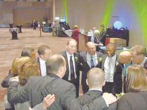 Screen grab from video shows London Mayor Matt Brown in group hug with his council after being sworn in at the London Convention Centre. MORRIS LAMONT/THE LONDON FREE PRESS /POSTMEDIA NETWORK