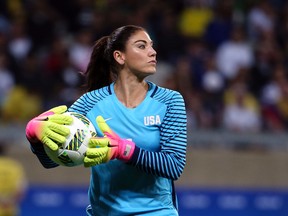 In this Aug. 3, 2016, file photo, United States’ goalkeeper Hope Solo holds the ball during a game at the Rio Olympics against New Zealand in Belo Horizonte, Brazil. (AP Photo/Eugenio Savio, File)