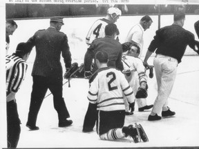 The 1964 Stanley Cup final - Bobby Baun was taken off the ice on a stretcher in Detroit in Game 6. (file photo)