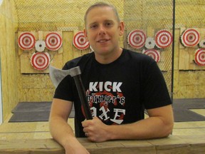 Bo Tait, one of the owners of Valley Axe in Sarnia, stands in one of the courts of the new indoor axe-throwing business on London Line on Saturday October 15, 2016 in Sarnia, Ont. Valley Axe hosted a fundraiser Saturday for the Inn of the Good Shepherd. Paul Morden/Sarnia Observer/Postmedia Network