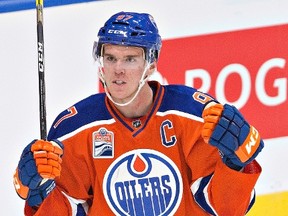 Edmonton Oilers' Connor McDavid celebrates a goal against the Calgary Flames during second period NHL action in Edmonton, Alta., on Wednesday October 12, 2016.