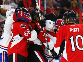 The Senators gang up on Montreal Canadiens' Brendan Gallagher on Oct. 15. (Errol McGihon, Ottawa Sun)