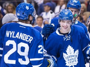 Toronto Maple Leafs' William Nylander congratulates Mitch Marner after their team's 4-1 win over the Boston Bruins following NHL action in Toronto on Oct. 15, 2016. (THE CANADIAN PRESS/Chris Young)