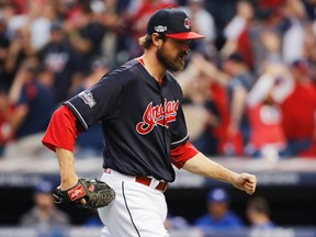 Indians relief pitcher Andrew Miller celebrates after striking out Blue Jays' Josh Donaldson during the eighth inning in Game 2 of the AL Championship Series in Cleveland on Saturday, Oct. 15, 2016. (Gene J. Puskar/AP Photo)