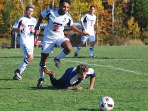 Laurentian Voyageurs' Zef Kraja falls in attempt to reach a loose ball during OUA action versus Toronto at the LU soccer fields on Sunday. The Voyageurs lost 4-0. Keith Dempsey/For The Sudbury Star