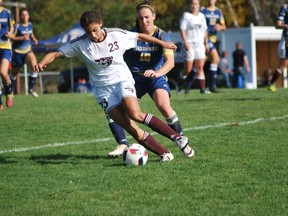 Laurentian Voyageurs' Catherine Rocca tries to defend Ottawa Gee-Gees' Morgan McNeil during OUA women's soccer at the LU soccer fields on Sunday. The Voyageurs won 2-1. Keith Dempsey/For The Sudbury Star