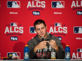 Indians pitcher Trevor Bauer discusses a recent injury to his right pinky finger caused by a drone during a news conference in Toronto on Sunday, Oct. 16, 2016. (Chrsitopher Katsarov/The Canadian Press)