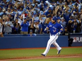 Blue Jays' Russell Martin rounds the bases after hitting a home run against the Rangers during Game 3 of the ALDS at the Rogers Centre in Toronto on Oct. 9, 2016. (Dave Abel/Toronto Sun)