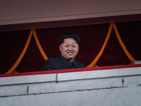 North Korea's leader Kim Jong-Un looks out towards Kim Il-Sung square during a mass military parade in Pyongyang on October 10, 2015.  Kim Jong-Un has overseen a series of purges, which may include Kung Sok Ung, North Korea's vice foreign minister for European affairs. South Korean media are reporting that he may have been banished to a rural farm as punishment. (ED JONES/AFP/Getty Images)