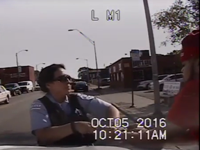 A screen grab from the Chicago Police video released Friday that shows an officer being beaten during an arrest.