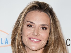 Brooke Mueller arrives at the 12th Annual Lupus LA Hollywood Bag Ladies Luncheon at The Beverly Hilton Hotel on November 21, 2014 in Beverly Hills, California. Mueller says she feels fortunate she didn't contract HIV from ex-husband Charlie Sheen. (Photo by Valerie Macon/Getty Images)