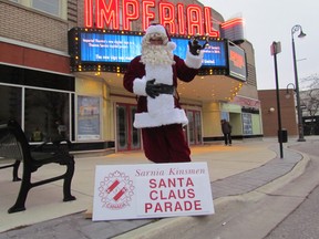 Santa Claus is shown in this 2014 file photo during a voluntary toll downtown for the Sarnia Kinsmen Santa Claus Parade of Lights. The service club is again raising money for the parade scheduled for Dec. 3. File photo/The Observer